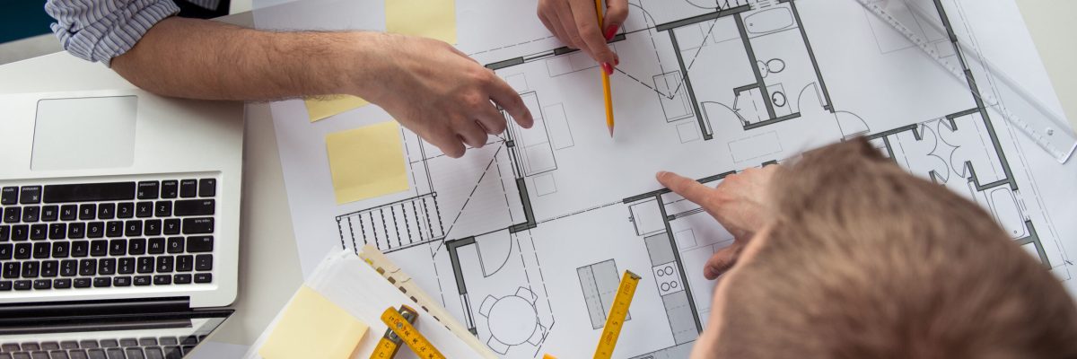 Making business plans Architect working on a building plans.