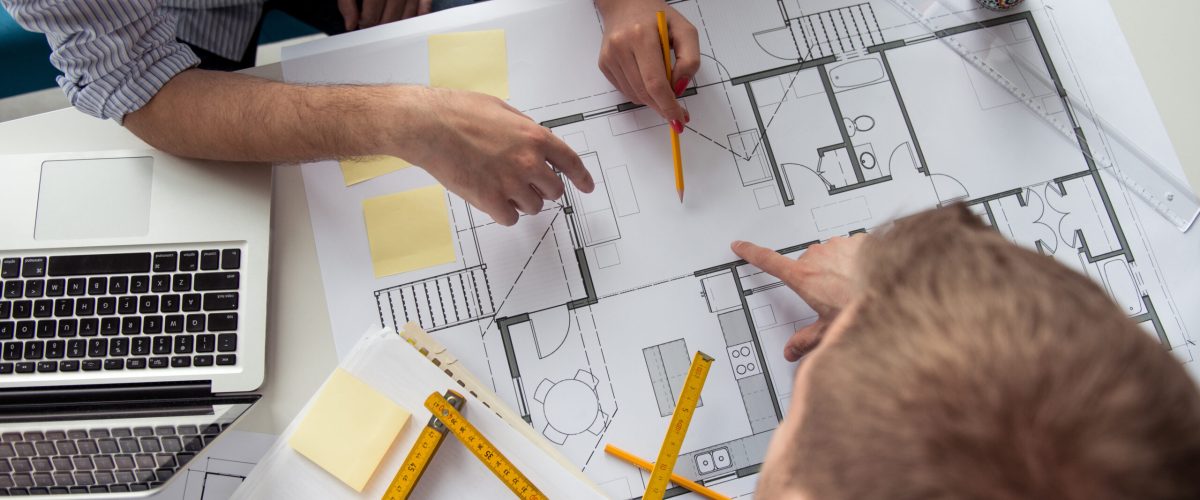 Making business plans Architect working on a building plans.