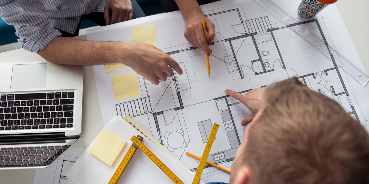 Making business plans Architect working on a building plans.